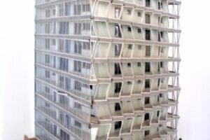 Dwa nowoczesne budynki mieszkalne z asymetryczną fasadą i oknami - Metamar