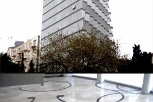 Nowoczesny taras z widokiem na miasto i drzewa.