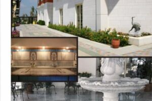 Białe nowoczesne patio z fontanną, oświetloną łazienką i roślinami - Metamar