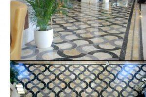 Wnętrze z geometryczną posadzką i doniczką roślinną - Metamar