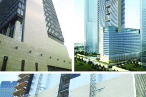 Nowoczesne wieżowce i budynki miejskie z szkłem i stalą