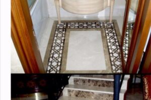 Hol wejściowy z geometrycznym dywanem i drewnianymi drzwiami - Metamar