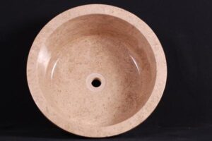 Beżowa marmurowa umywalka okrągła na czarnym tle - Metamar